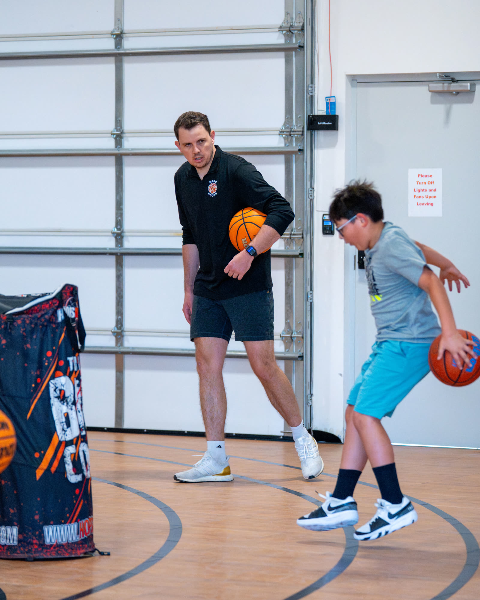 Coach and player working through a dribble move